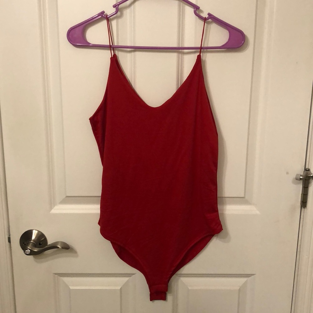 NWT Red Bodysuit. Snap button closure.